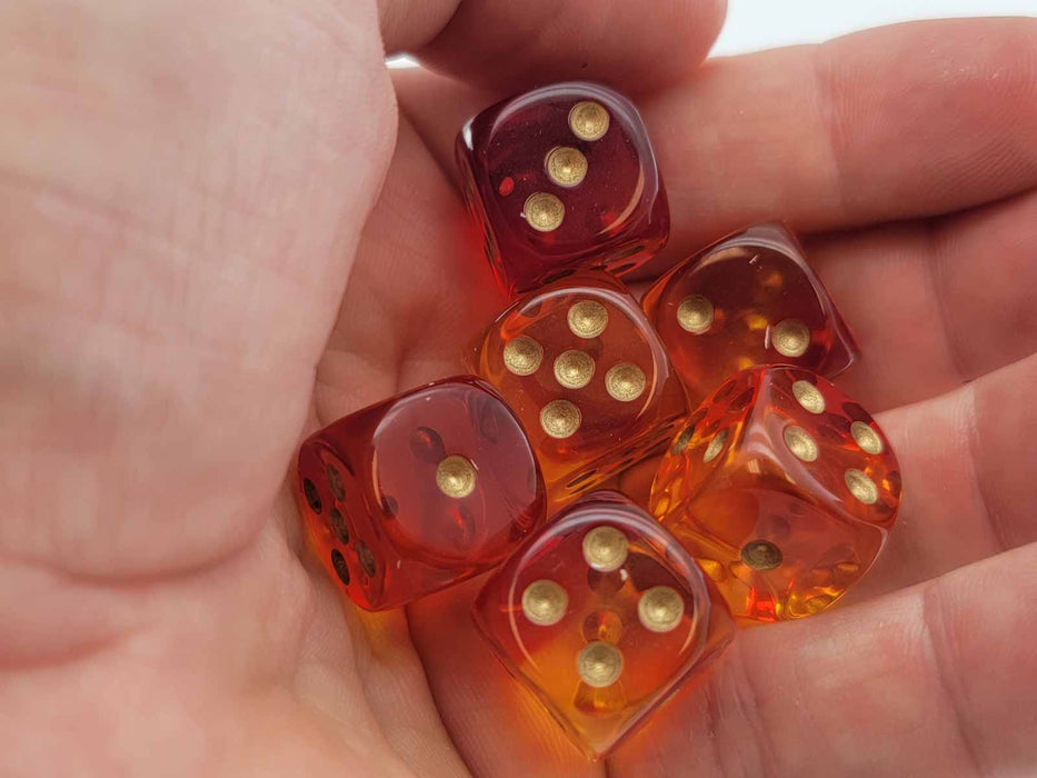 Gemini 16mm D6 Dice Block (12 Dice) - Translucent Red-Yellow with Gold Numbers